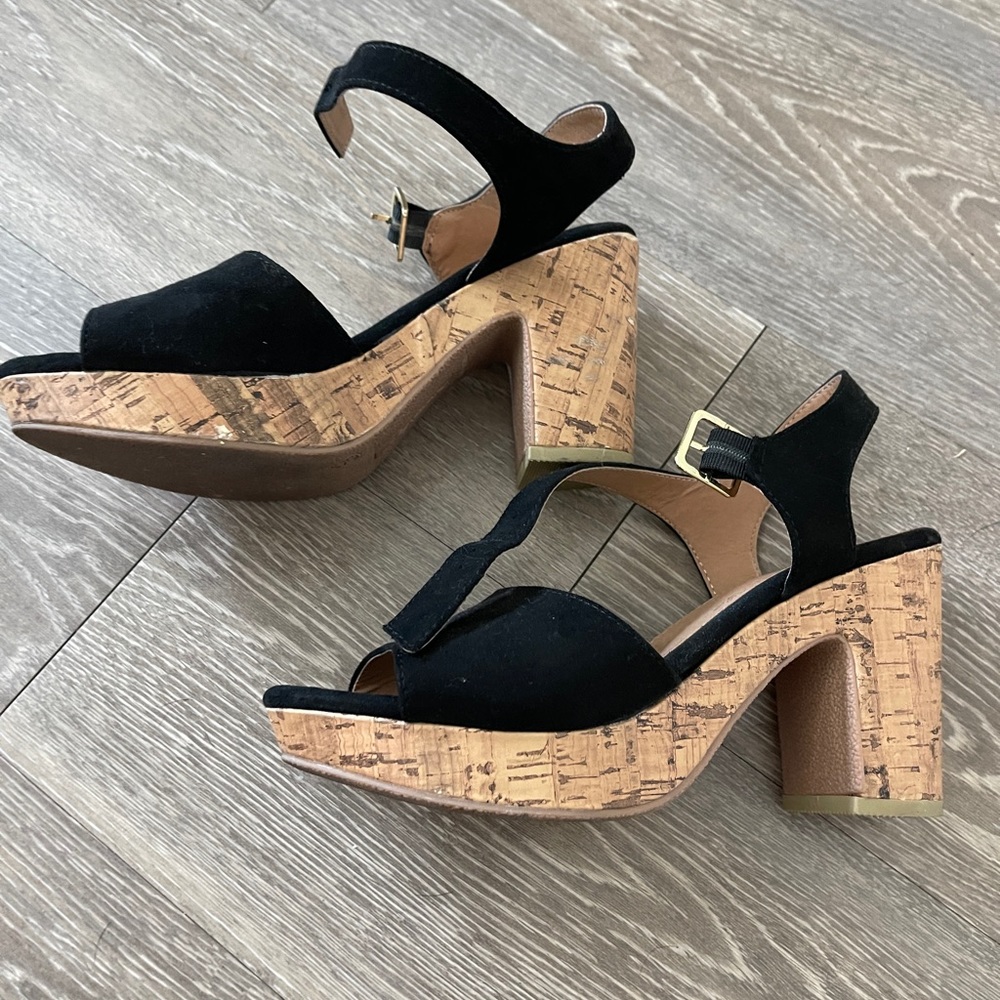 Black with cork chunky heels. Size 6.5. Great condition.